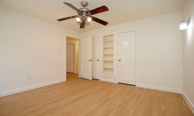 unfurnished bedroom featuring ceiling fan and light hardwood / wood-style flooring