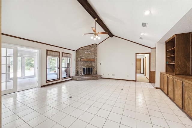 unfurnished living room featuring light tile patterned flooring, beam ceiling, a brick fireplace, crown molding, and ceiling fan