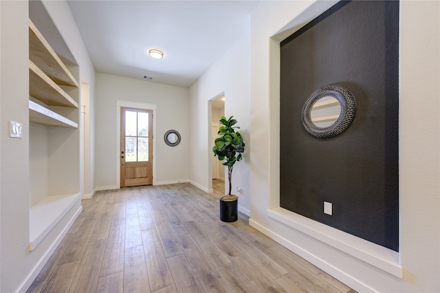 foyer entrance featuring light wood-type flooring