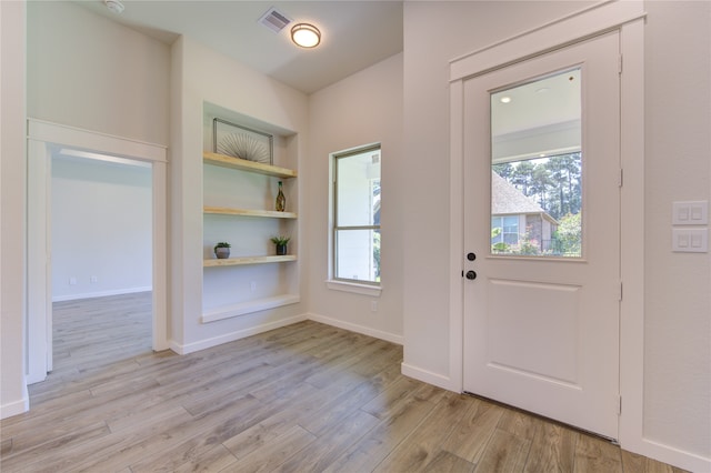 entrance foyer featuring light wood-type flooring