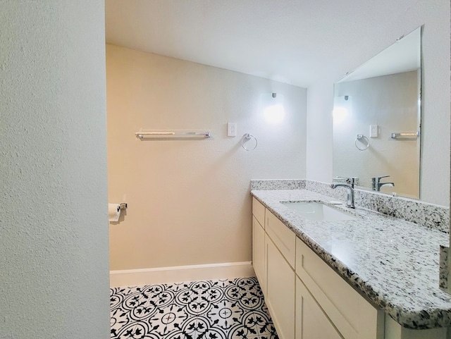 bathroom featuring vanity and tile patterned floors