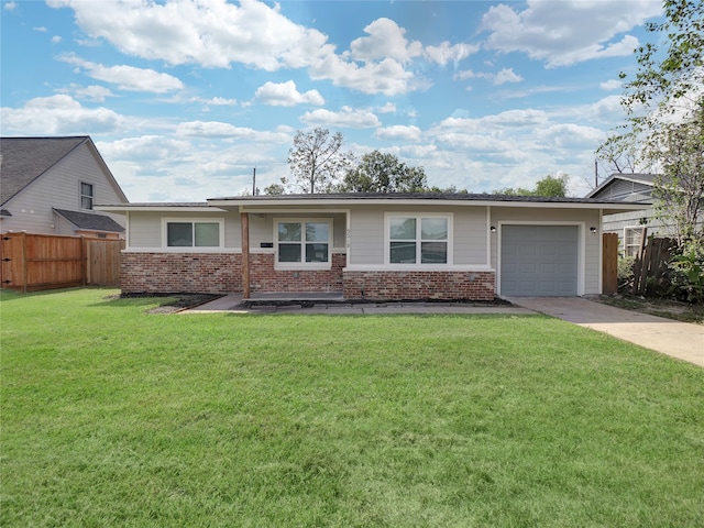 ranch-style house with a front lawn and a garage