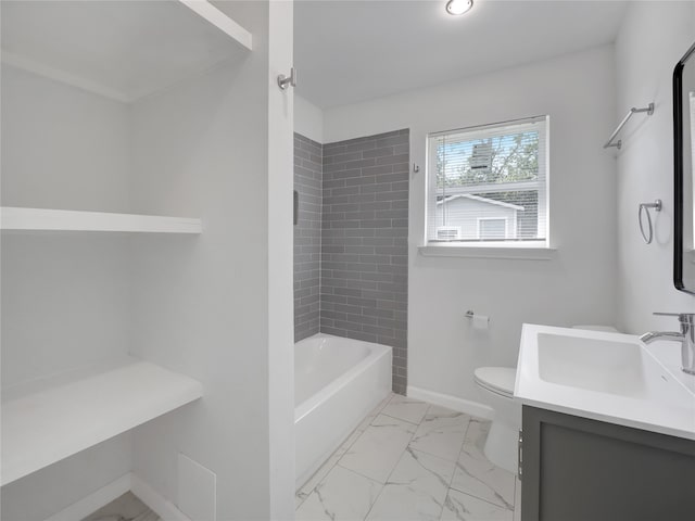 full bathroom featuring tiled shower / bath combo, vanity, and toilet