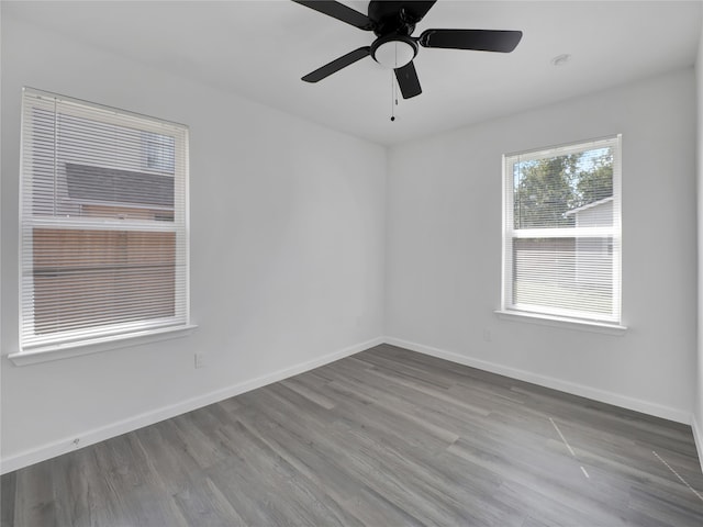 unfurnished room with ceiling fan and light wood-type flooring