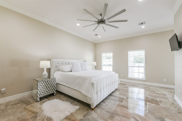 bedroom with ceiling fan and crown molding