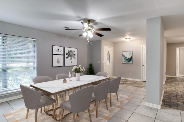 dining area featuring ceiling fan