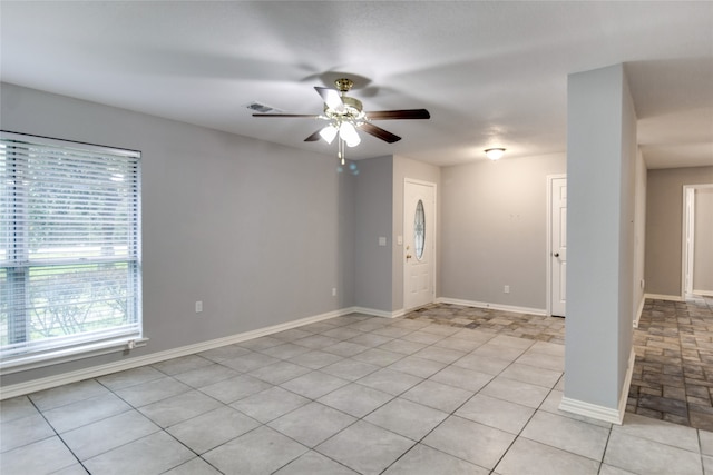 spare room with ceiling fan