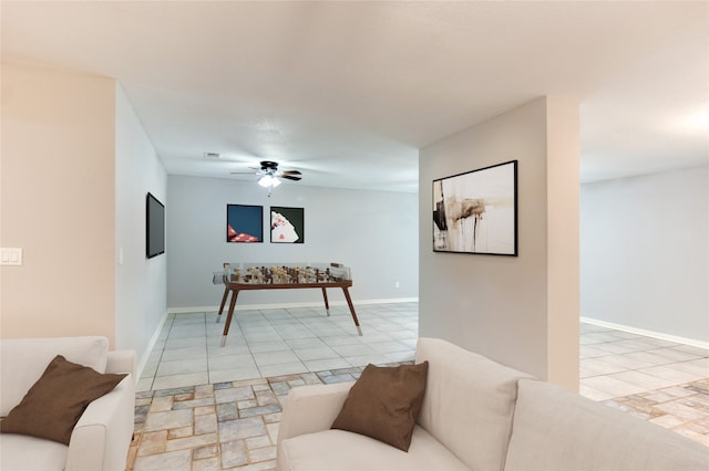 living room with ceiling fan