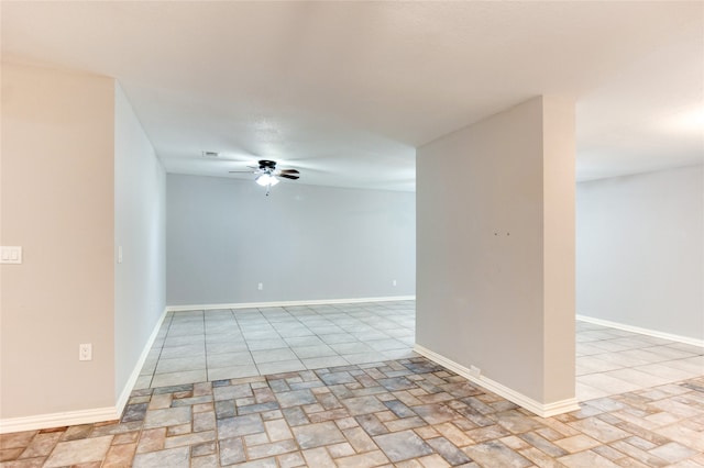 spare room with ceiling fan