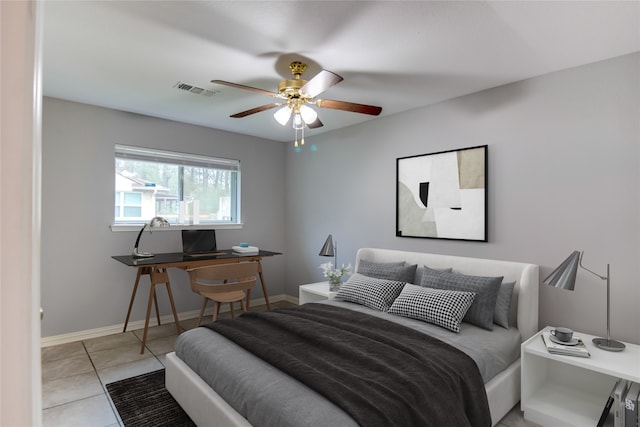 bedroom featuring ceiling fan and light tile patterned floors