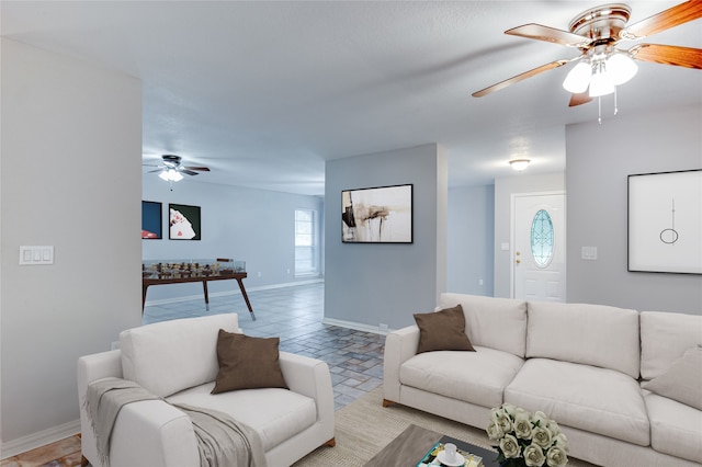 living room with ceiling fan