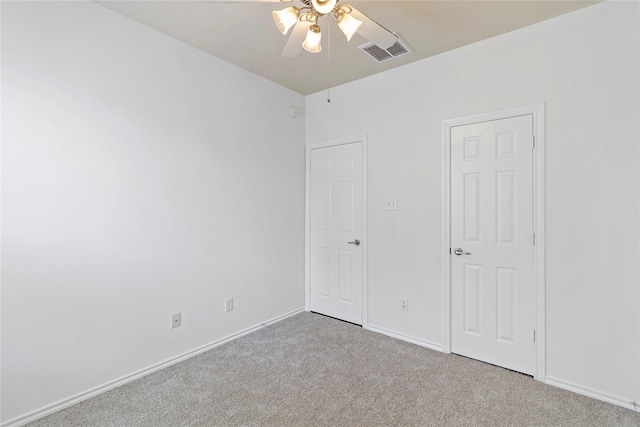 23307 W Pine Ivy Ln, Tomball, TX 77375 - unfurnished bedroom featuring carpet flooring, baseboards, and ceiling fan