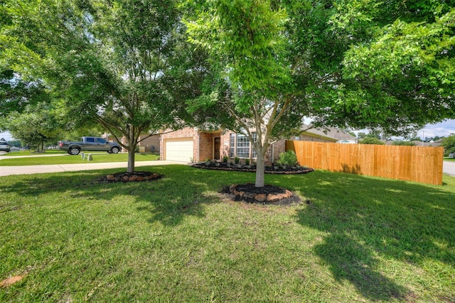 view of yard featuring a garage