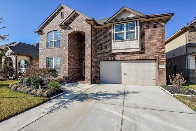 view of front of property with a garage