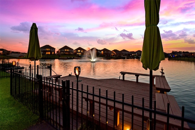 view of dock with a water view