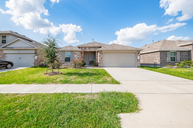 ranch-style house featuring a garage and a front lawn