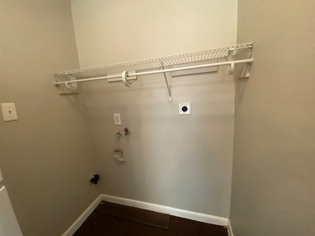 laundry room with hookup for an electric dryer and hookup for a washing machine