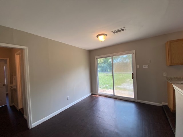 interior space featuring dark hardwood / wood-style flooring