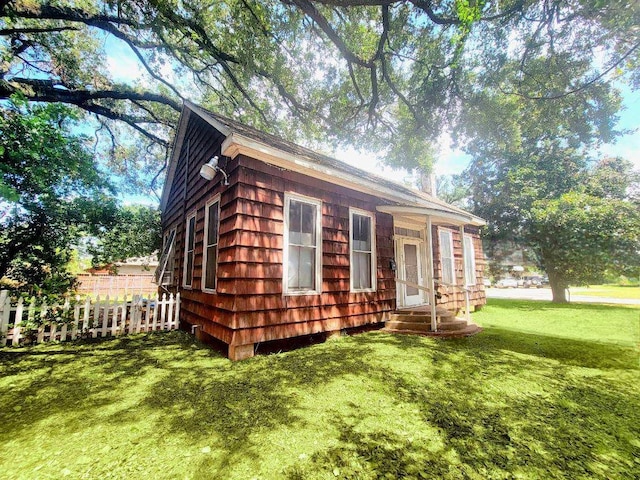 view of front of home with a front yard