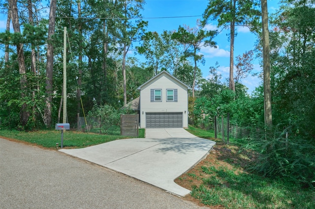 view of side of home with a garage