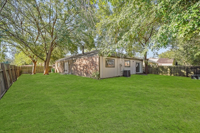 view of yard featuring central AC