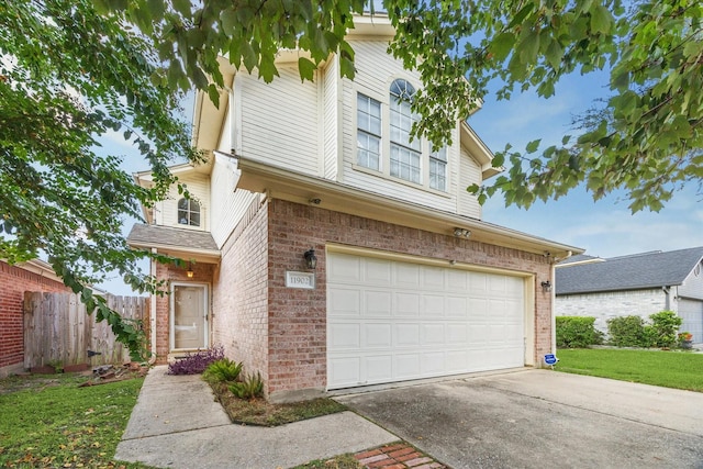 view of front of property with a garage