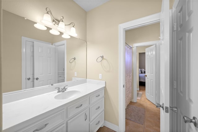 bathroom featuring tile patterned floors and vanity