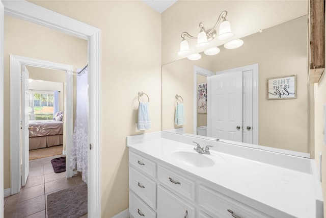 bathroom with vanity and tile patterned floors