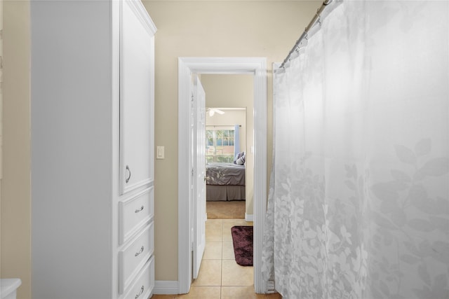 bathroom featuring tile patterned flooring