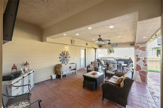 view of patio / terrace featuring ceiling fan and an outdoor hangout area