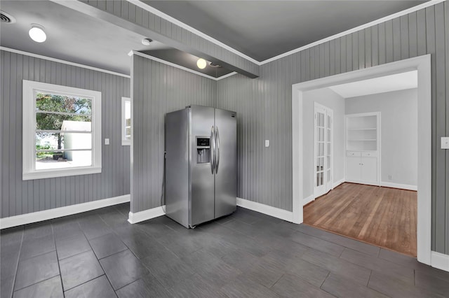 kitchen with stainless steel fridge, ornamental molding, dark hardwood / wood-style flooring, and built in features