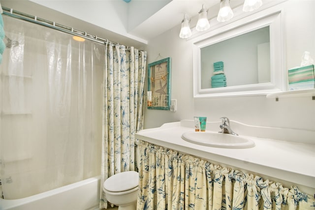 full bathroom with vanity, toilet, and shower / bath combo