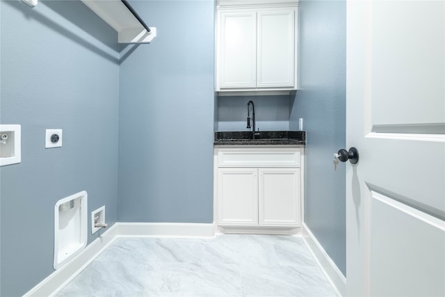 laundry area featuring cabinets, hookup for an electric dryer, hookup for a washing machine, and sink