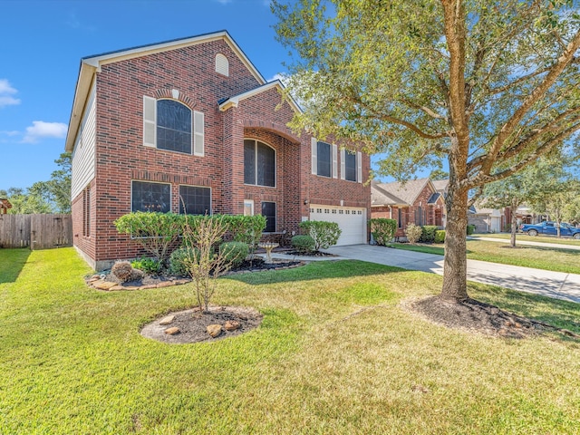 view of front of home featuring a front yard and a garage