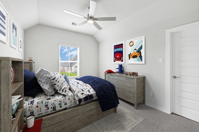 bedroom with carpet flooring, ceiling fan, and vaulted ceiling