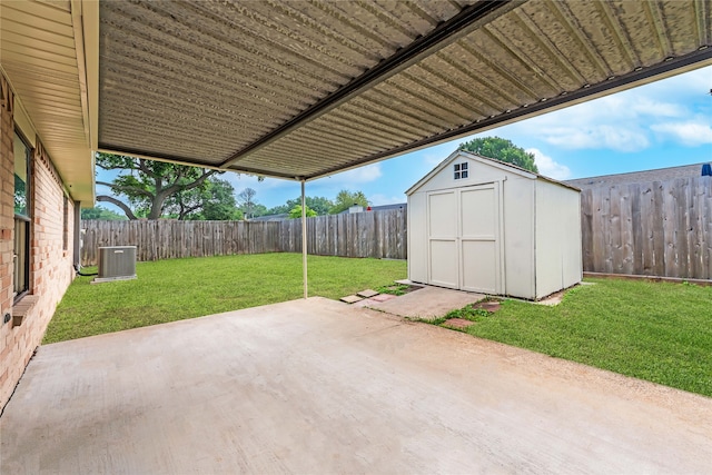 view of patio with a shed and central AC unit