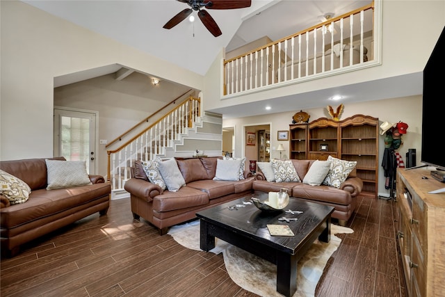 living room featuring ceiling fan, dark wood-type flooring, and high vaulted ceiling