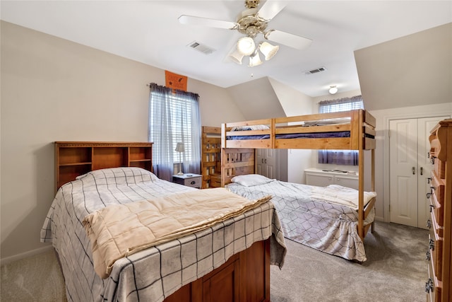 bedroom with light carpet and ceiling fan