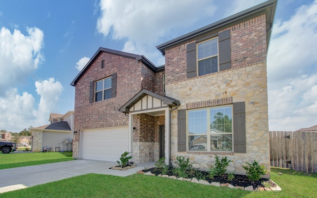 view of front of house with a front yard and a garage