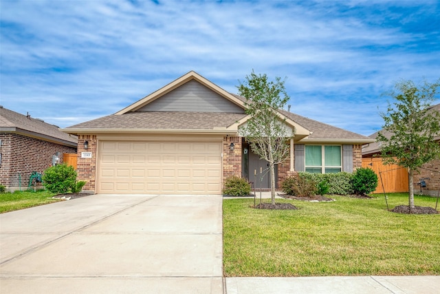 single story home with a front yard and a garage