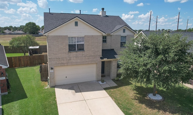 view of front facade featuring a front lawn and a garage