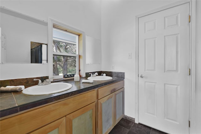 bathroom with vanity and tile patterned floors