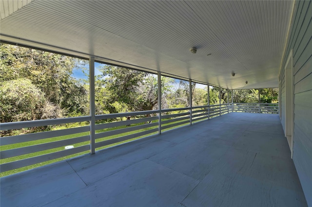 view of patio featuring a balcony