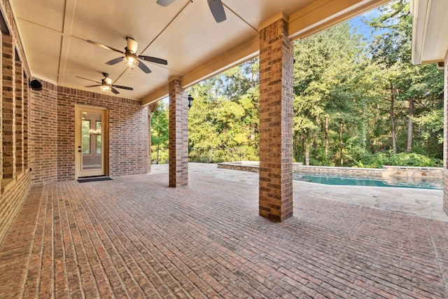 view of patio featuring ceiling fan