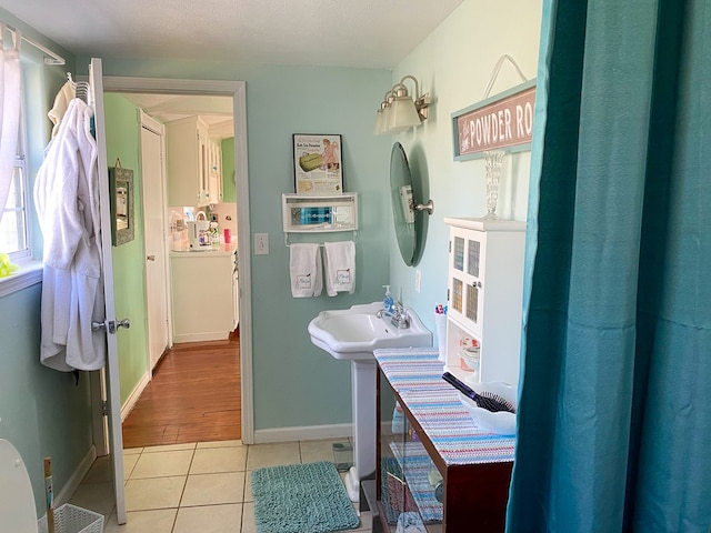 bathroom with tile patterned flooring