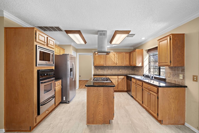 kitchen with sink, ornamental molding, a kitchen island, island exhaust hood, and stainless steel appliances