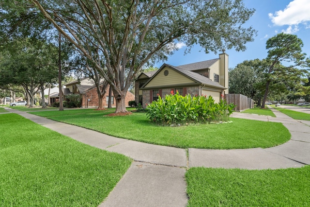 view of side of home featuring a lawn