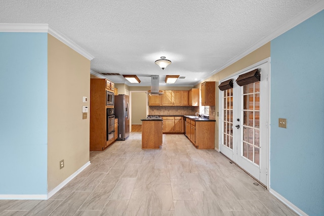 kitchen with decorative backsplash, french doors, island exhaust hood, stainless steel appliances, and crown molding