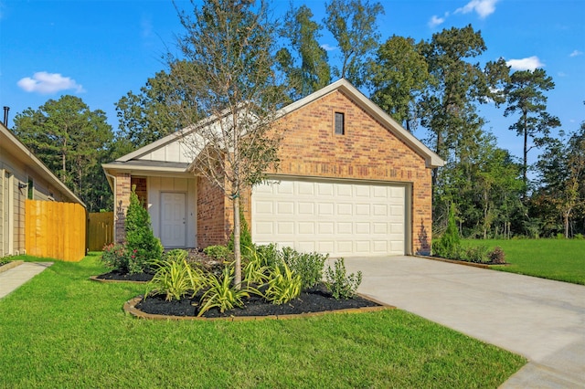 view of front of property featuring a front lawn and a garage