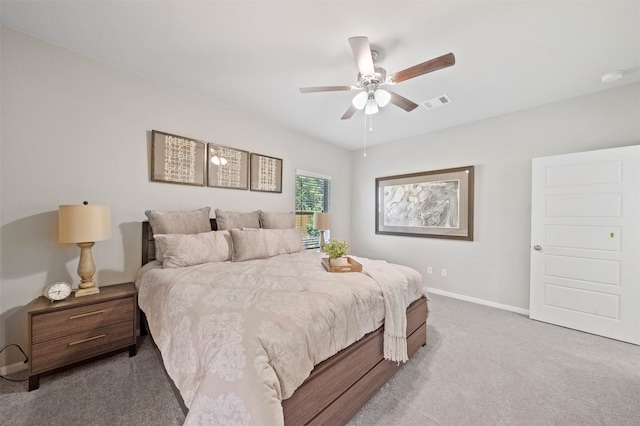 bedroom with ceiling fan and carpet